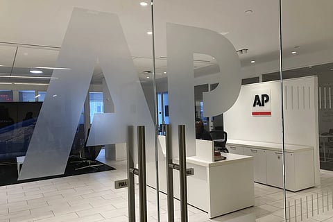 The Associated Press logo is shown at the entrance to the news organisation's office in New York on Thursday, July 13, 2023.