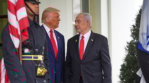 President Donald Trump, left, greets Israel's Prime Minister Benjamin Netanyahu at the White House, Monday, April 7, 2025, in Washington.