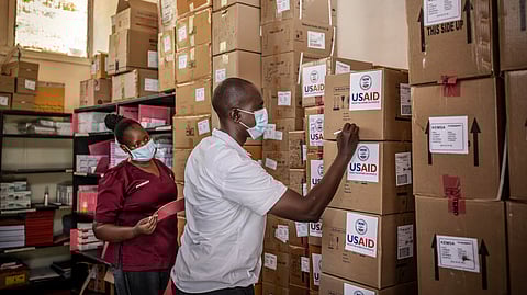 Members of the pharmacology department take inventory of the last boxes of drugs delivered by the now-dismantled United States Agency for International Development (USAID) amid medical supply shortages in a pharmacy storeroom at Lodwar County Referral Hospital in Lodwar on April 1, 2025.
