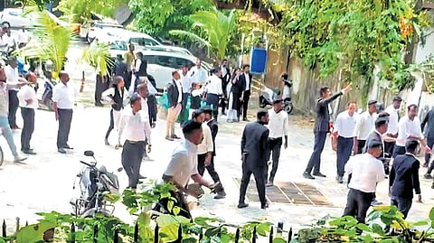 Lawyers pelting stones at Maharaja’s College following violent clash between students and members of Ernakulam Bar Association on Friday.