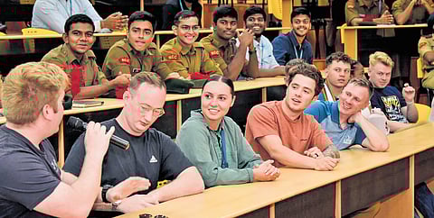 United States Navy’s P-8A Poseidon maritime patrol aircraft crew members interacting with students at VIT