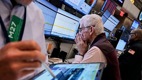 A trader works on the options floor of the New York Stock Exchange, Thursday, April 10, 2025.