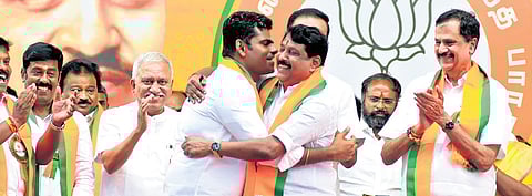 BJP leader Nainar Nagenthran being greeted on his election as president of the party’s state unit by outgoing chief K Annamalai, at an event held in Vanagaram, Chennai, on Saturday