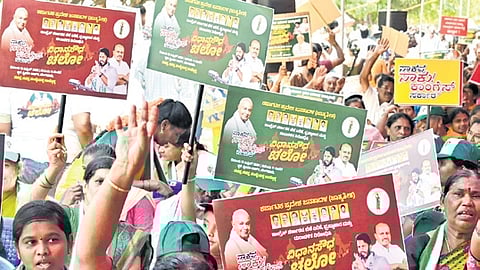 JDS workers protest against the state government over price hike at Freedom Park in Bengaluru on Saturday.