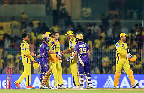 Players exchange handshake after the Indian Premier League 2025 match between Kolkata Knight Riders and Chennai Super Kings.