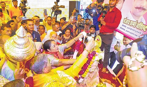 Chief Minister Rekha Gupta during a visit to Hanuman Temple on the occasion of Hanuman Jayanti, at Connaught Place, in New Delhi on Saturday.