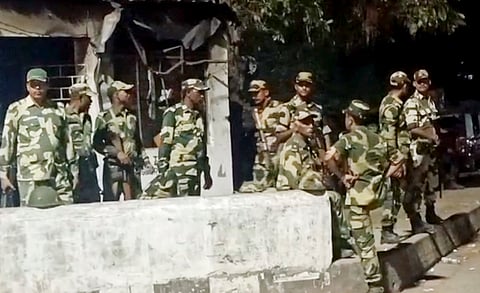 Security forces personnel guard in a violence-hit area of Jangipur, in Murshidabad district, Sunday, April 13, 2025. Violence erupted in the area following protests over Waqf Act.