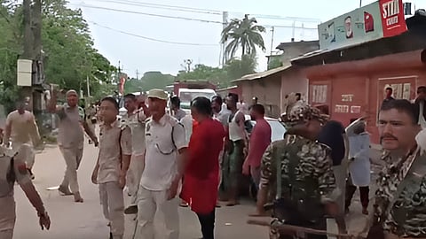 Agitators and police clash at a rally held against the Waqf Act in Cachar district of Assam.