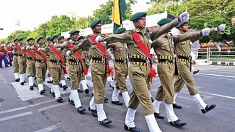 A parade featuring contingents of college students and police personnel took place on Rabindra Mandap-Jayadev Bhawan stretch.