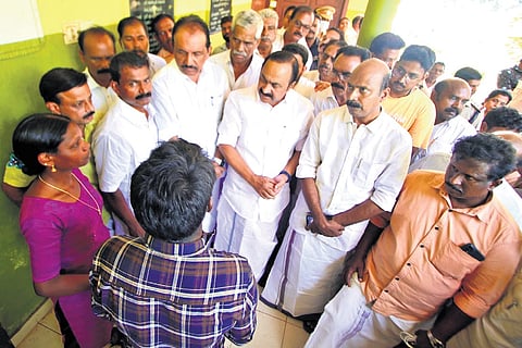 Leader of Opposition V D Satheesan speaks to the families of Satheesh and Ambika at Athirappilly in Thrissur on Tuesday