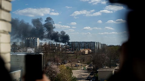 Smoke rises from an explosion following a Russian drone strike on Sumy, Ukraine, Monday, April 14, 2025.