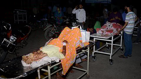 Patients being evacuated after a fire broke out at Lok Bandhu hospital, in Lucknow, Monday, April 14, 2025.