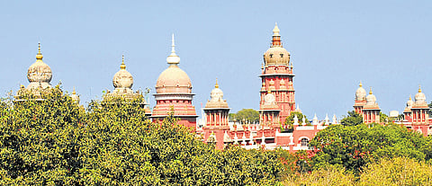 Madras High Court temporarily stayed an order of a single judge who had allowed the CMRL to construct a station at Thousand Lights through Sri Rathina Vinayagar and Durgai Amman temples on Whites Road.
