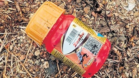 The bottle of chemical recovered from the school premises in Dharampuri village of Echoda mandal in Adilabad district on Wednesday