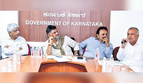 Deputy CM DK Shivakumar chairs a meeting with Vokkaliga legislators on Tuesday.