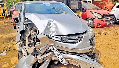 The car knocked down the victim and rammed a nearby tree