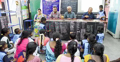 Students of the panchayat union primary school take part in Symbiotic Learning Model programme on Wednesday