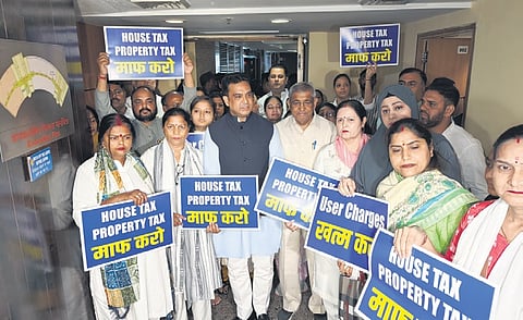 AAP councillors stage a protest outside the MCD Commissioner’s office in Delhi on Wednesday.