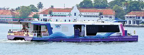 A Water Metro vessel sailing through the Kochi backwaters