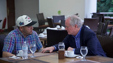 Maryland Sen. Chris Van Hollen, right, speaks with Kilmar Abrego Garcia, a Salvadoran citizen who was living in Maryland and deported to El Salvador by the Trump administration, in a hotel restaurant in San Salvador, El Salvador, Thursday, April 17, 2025.