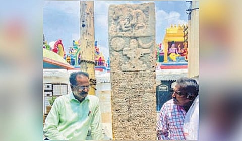 The inscription, detailing a royal grant of Gundala village for temple festivities, has 55 lines in Telugu, with only the top 19 visible.