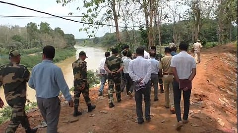 A Tripura government delegation, accompanied by BSF officials, inspects the border area with Bangladesh on Sunday.