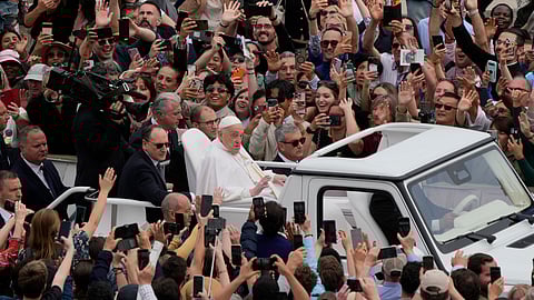 Pope Francis tours St. Peter's Square in his popemobile after bestowing the Urbi et Orbi (Latin for to the city and to the world) blessing at the end of the Easter mass presided over by Cardinal Angelo Comastri in St. Peter's Square at the Vatican on Sunday, April 20, 2025.
