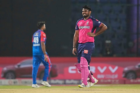 Rajasthan Royals' captain Sanju Samson reacts in pain during the Indian Premier League cricket match between Delhi Capitals and Rajasthan Royals at Arun Jaitley Stadium in New Delhi, India, Wednesday, April 16, 2025.