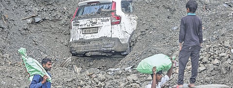 Debris after a rain-triggered landslide hit Ramban district on Sunday.