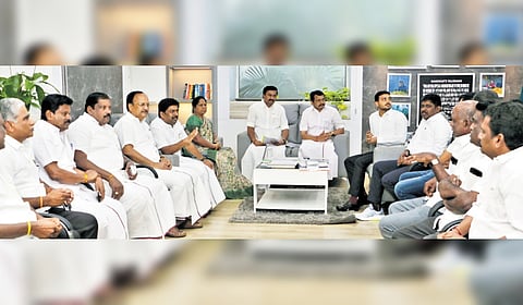 Ministers MP Saminathan, V Senthil Balaji and Kayalvizhi Selvaraj, and officials hold talks with power loom workers in Coimbatore on Sunday