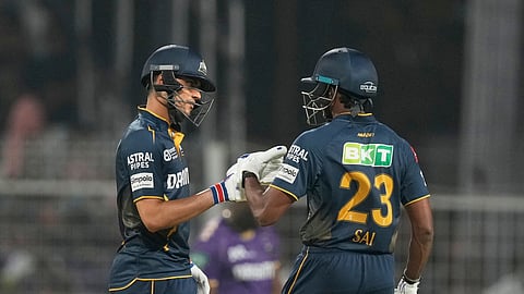 Gujarat Titans' captain Shubman Gill, left, and Sai Sudharsan greets each other during the Indian Premier League cricket match between Kolkata Knight Riders and Gujarat Titans at Eden Gardens in Kolkata, India, Monday, April 21, 2025.
