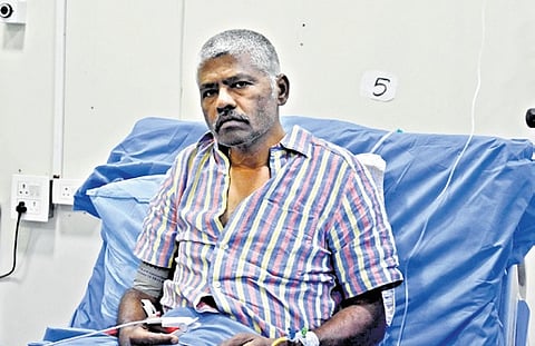 Balachandru, a tourist from Madurai, undergoing treatment at a hospital in Anantnag