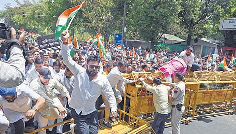 Holding placards, protesters broke through police barricades on Thursday | Parveen Negi