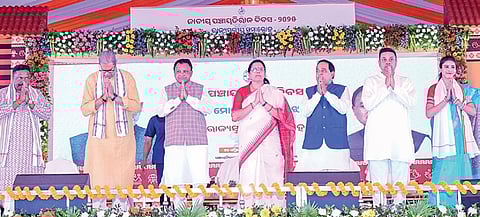 CM Mohan Majhi, dy CMs KV Singh Deo and Pravati Parida along with ministers and Puri MP Sambit Patra at the launch of the programme in Puri, on Thursday
