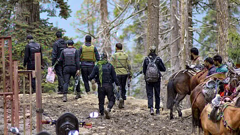 Security personnel near the site of the Pahalgam terror attack, in Anantnag district, Jammu and Kashmir.