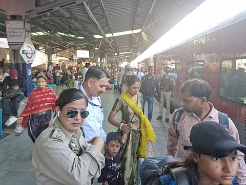 Tourists seen boarding the special trains operated by Northern Railway at Jammu Tawi railway station (Photo | Special arrangement)