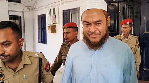 Police personnel take AIUDF MLA Aminul Islam to produce before a court as he was arrested on sedition charges for allegedly defending Pakistan following the Pahalgam terror attack, in Nagaon district, Assam, April 25, 2025.