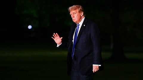US President Donald Trump waves as he arrives on the South Lawn of the White House, Thursday, April. 24, 2025, in Washington.