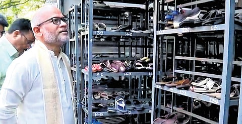 TTD AEO Venkaiah Chowdhury inspects the free cheppal stand in Tirumala.