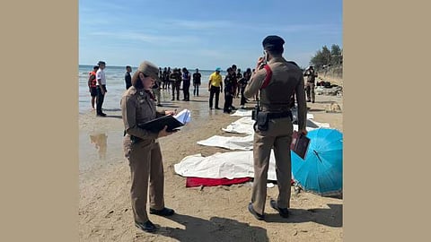 The photos show the plane in the sea about 100 meters off shore
