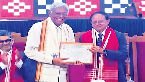 Girish Mohan Gupta (left) receiving his MBA degree at the annual convocation ceremony of IIM-Sambalpur