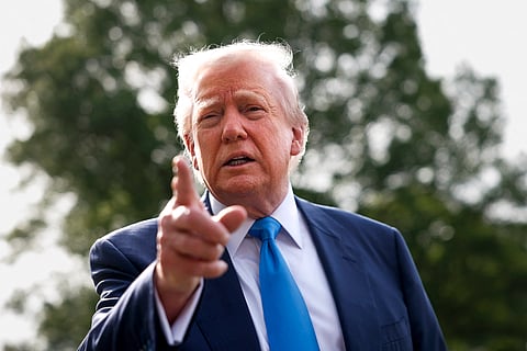 U.S. President Donald Trump speaks to the media as he departs the White House on April 25, 2025 in Washington, DC. President Trump and the first lady are traveling to Rome to attend the funeral of Pope Francis.