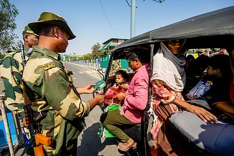 Amritsar: BSF jawans check documents of Pakistani nationals as they arrive at the Integrated Check Post at the Attari-Wagah border to move to their country, near Amritsar, Saturday, April 26, 2025. India has announced the closure of the Attari border for all movement as part of heightened security measures following the Pahalgam terror attacks.