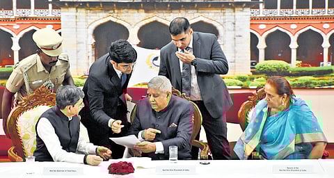Vice-President Jagdeep Dhankhar (centre) and Governor RN Ravi during the event at TNAU in Coimbatore on Sunday