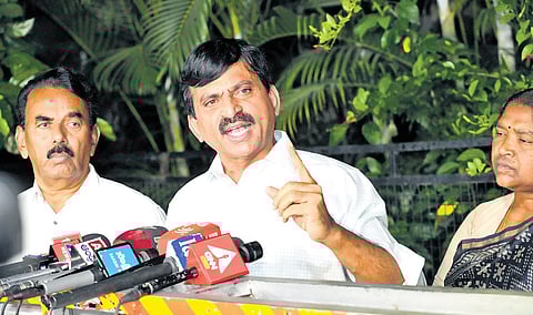 Revenue Minister Ponguleti Srinivasa Reddy addresses the media outside the residence of Chief Minister A Revanth Reddy in Hyderabad on Sunday