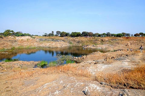An abandoned open stone quarry in Velampalayam in Tiruppur district.