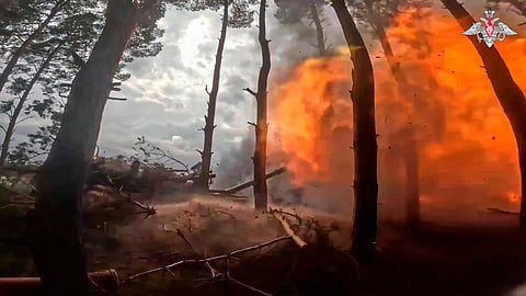 In this photo taken from video distributed by Russian Defense Ministry Press Service on Sunday, April 27, 2025, a Russian Army 152mm howitzer Giatsint-B fires towards Ukrainian positions in Kherson, Ukraine.