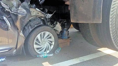 The badly damaged car that rammed into a container truck in Thotapalli village of Tirupati district