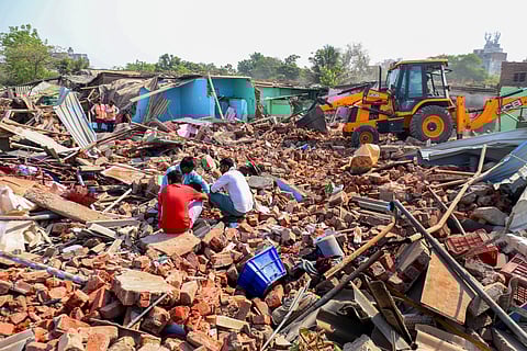 Debris after a demolition drive by the Amdavad Municipal Corporation (AMC) near Chandola lake, in Ahmedabad, Tuesday, April 29, 2025.