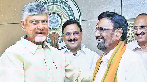 Paka Venkata Satyanarayana, BJP candidate for the Rajya Sabha seat, meets Chief Minister N Chandrababu Naidu at the Secretariat in Velagapudi on Tuesday.